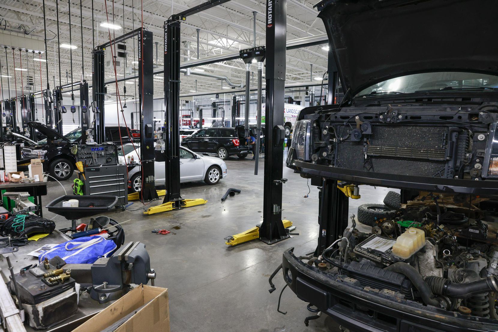 A Ford pick-up truck sits in a service bay at Platinum Ford in Terrell, Texas Monday, May...