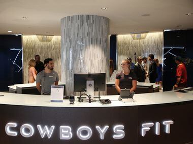 Clerks at the entrance of Cowboys Fit during a media tour of health and fitness center at...