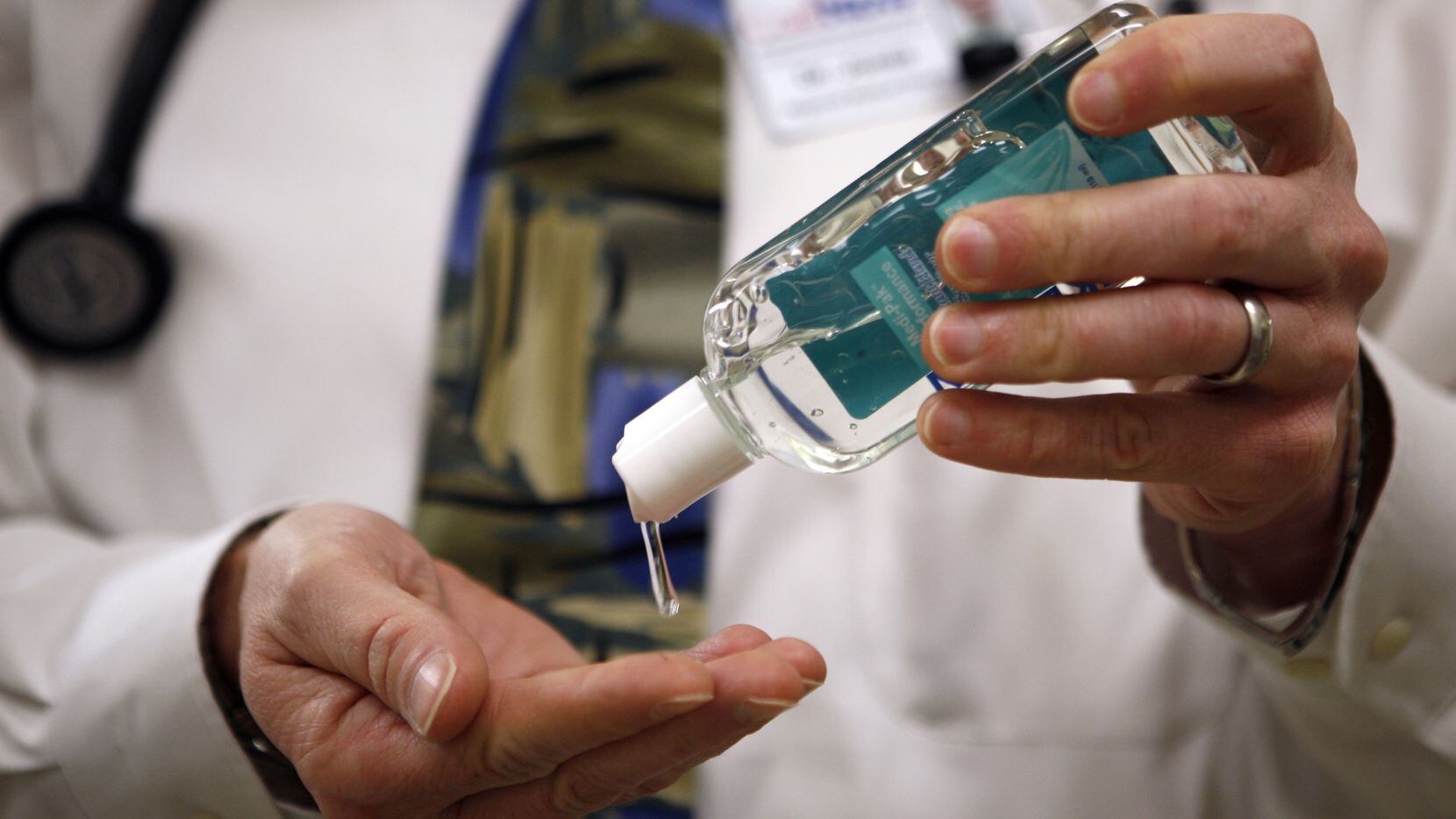 Health experts urge people to make frequent use of hand sanitizer and soap to help protect...