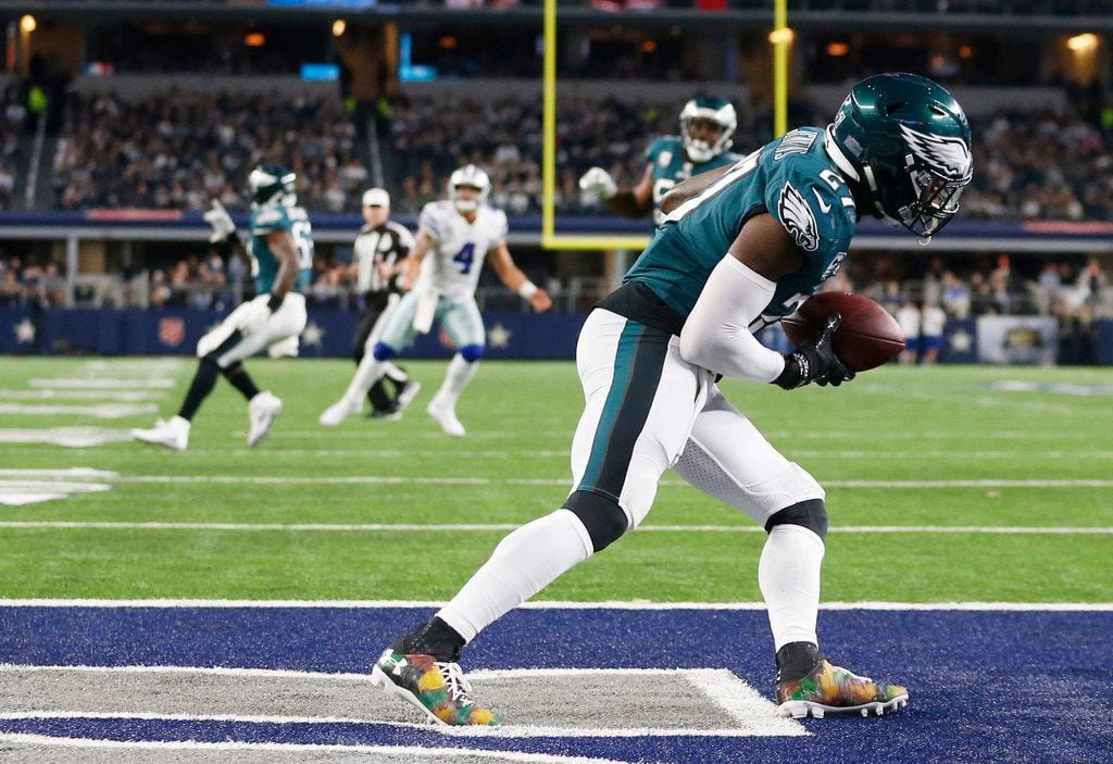 FILE - Philadelphia Eagles strong safety Malcolm Jenkins (27) intercepts a pass from Dallas...