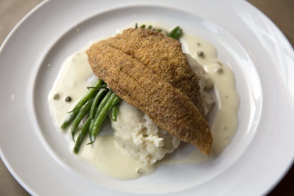 Julia Pearl offers cornmeal crusted catfish with whipped potatoes, green beans, and caper...