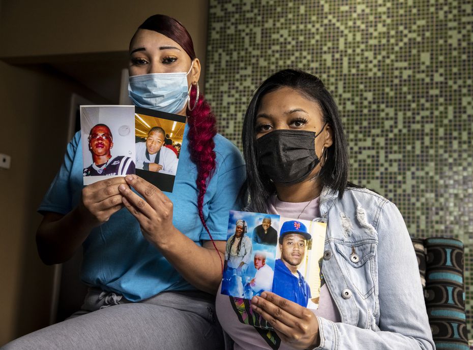 Cousins Nicole Hill (left) and Netia Smith hold photos of deceased brothers Isaac (second from left) and Ishmael Mozeke (left) at Smith’s apartment in Dallas. The cousins, particularly Hill, were longtime family friends of the Mozeke brothers, both of whom died by gun violence two decades apart.