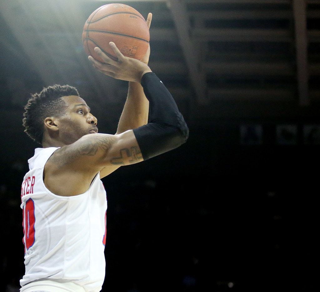 SMU guard Jarrey Foster (10) shoots the ball in the first half of an NCAA basketball game...