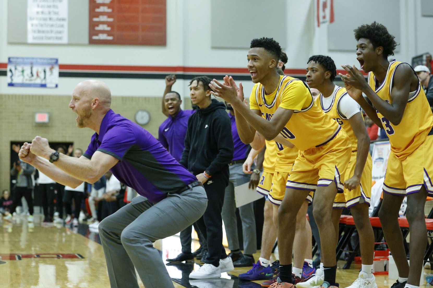 Richardson head coach Kevin Lawson reacts with the team after a basket during the fourth...
