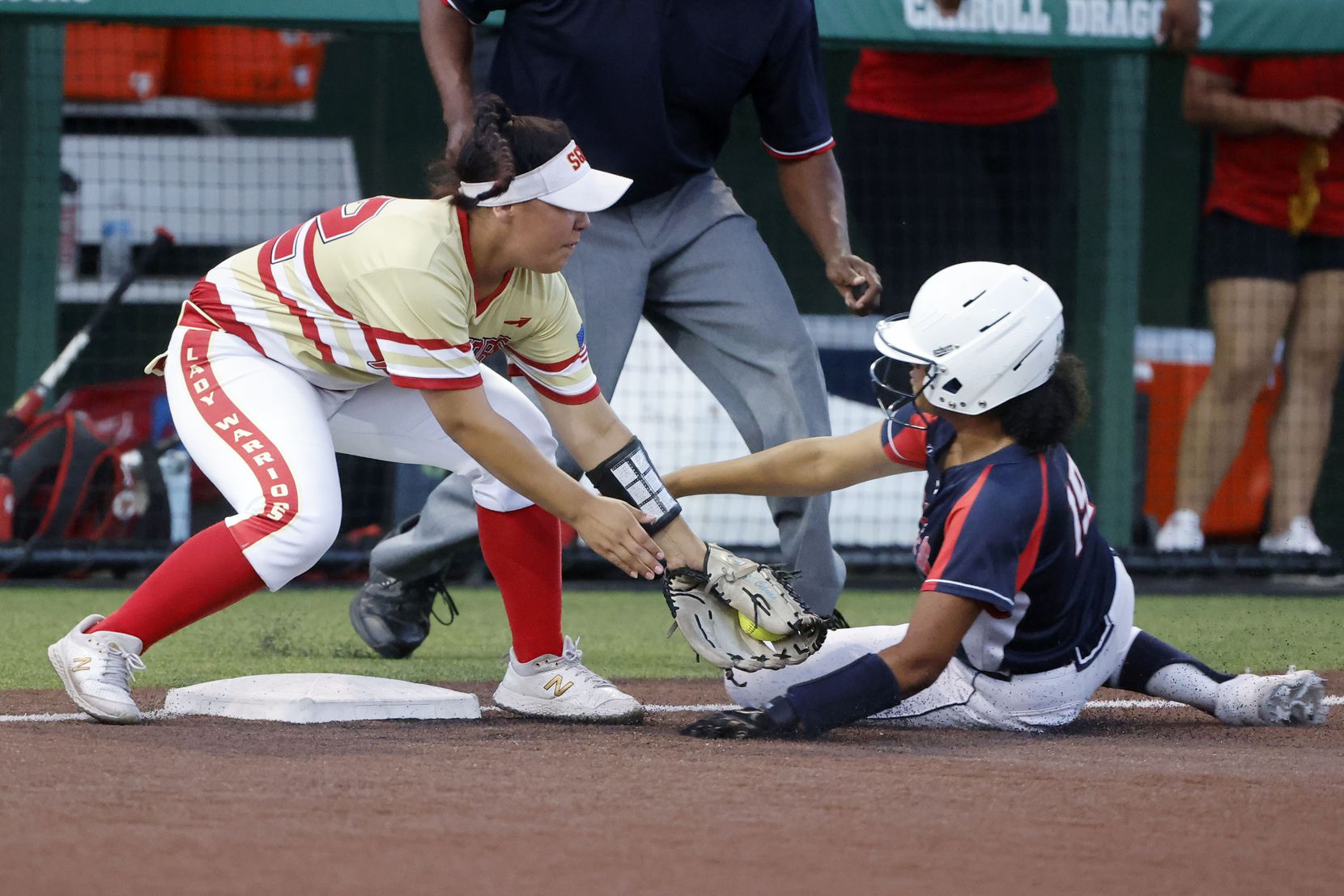 South Grand Praire’s Ema Cebrian (22), tags out Allen’s Micaela Booth (19) at third during...