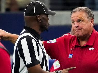Arkansas head coach Sam Pittman argues for a call during the first half of an NCAA football...