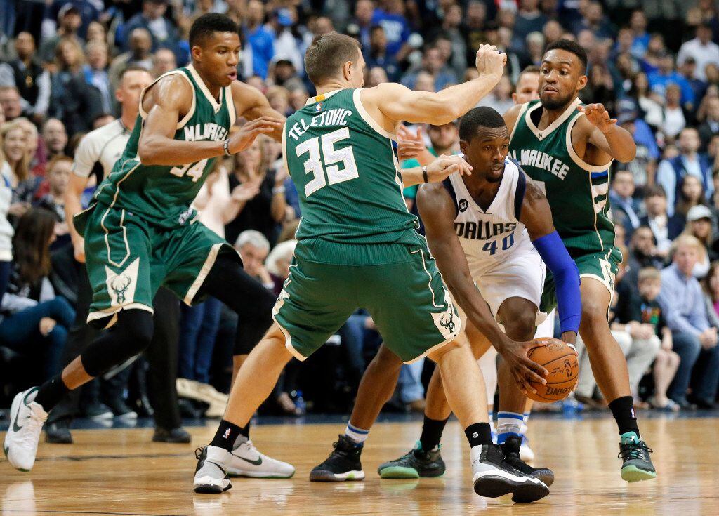Dallas Mavericks forward Harrison Barnes (40) maneuvers to get out of coverage by Milwaukee...
