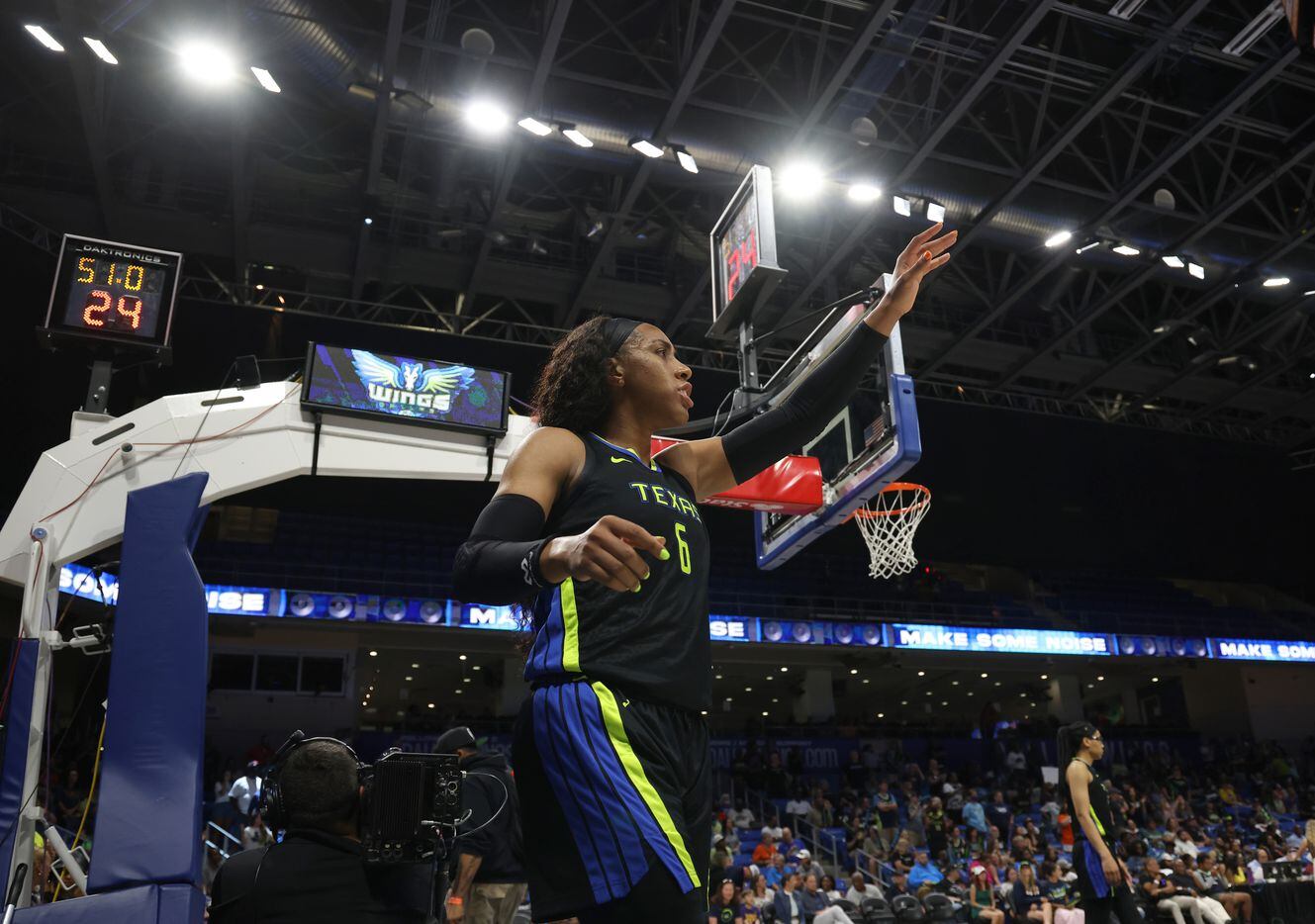 Dallas Wings forward Kayla Thornton (6) directs a teammate before throwing the ball in with...