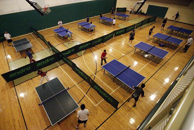 This file photo shows pingpong tables on the basketball courts weekly at the Tom Muehlenbeck...