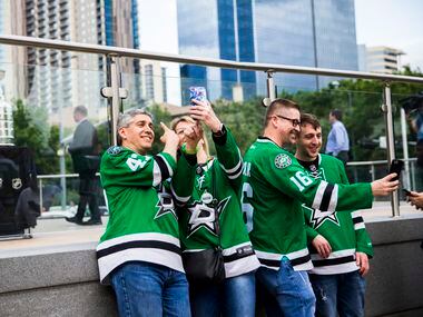 Fans take photos with the Stanley Cup outside American Airlines Center before Game 6 of the...