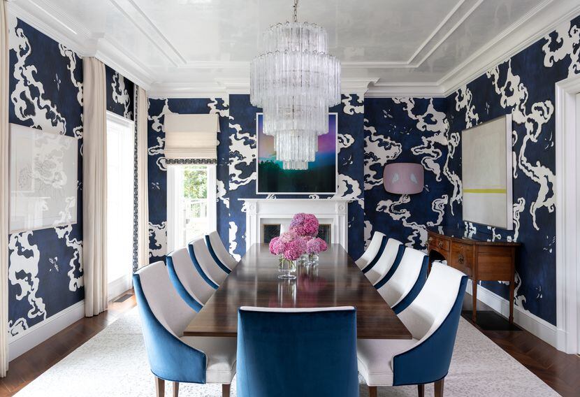 Bold color is starting to saturate every room of the house, including in the blue dining...