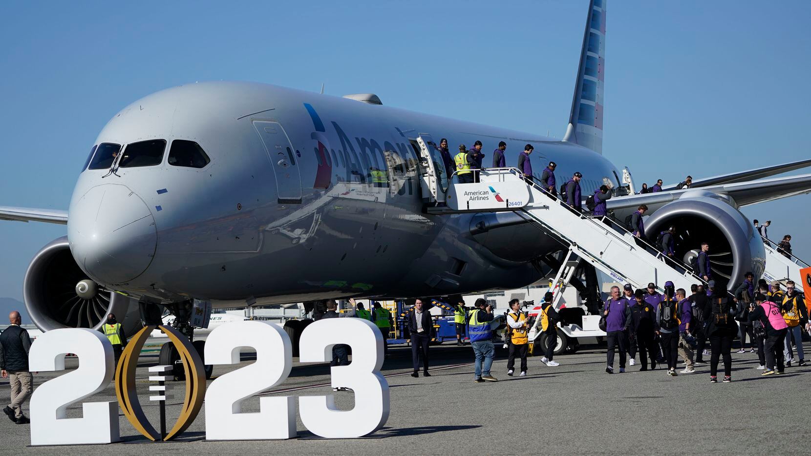The TCU football team arrives to Los Angeles International Airport ahead of the national...