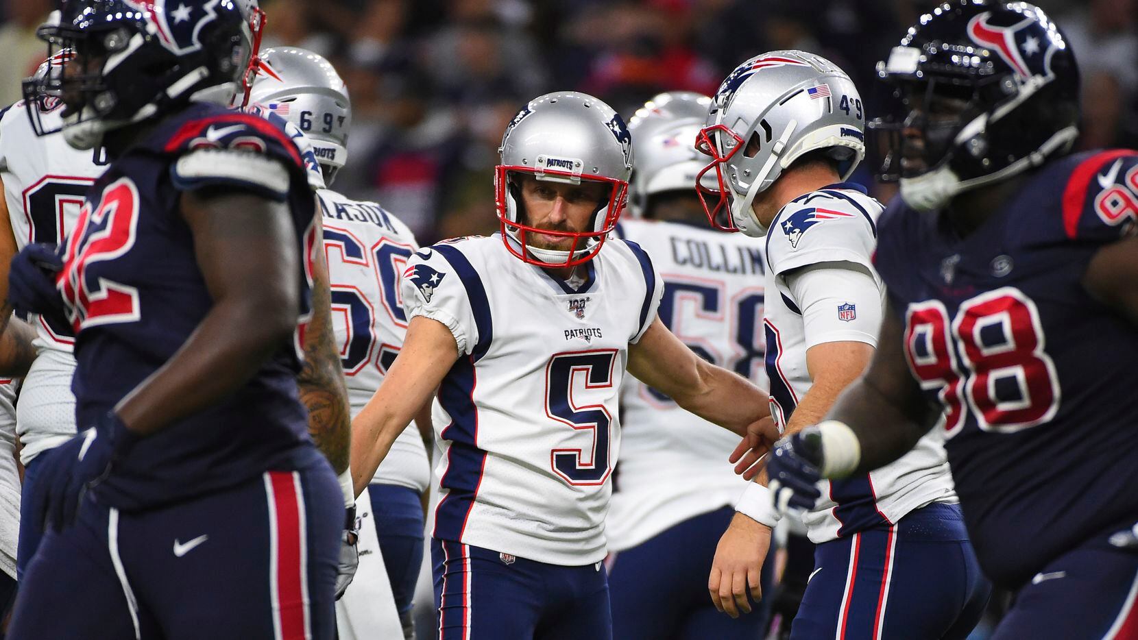New England Patriots kicker Kia Forbath (5) celebrates after he kicked a field goal against...