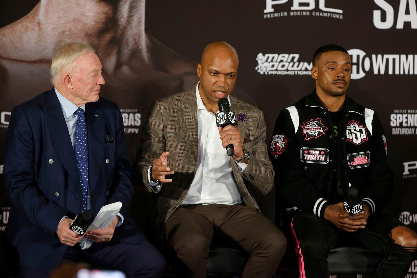 Dallas Cowboys owner Jerry Jones , trainer Derrick James, and WBC and IBF world champion...
