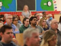 Frisco residents listen to Joel Fitts, Transportation Planning Manager with City of Frisco,...