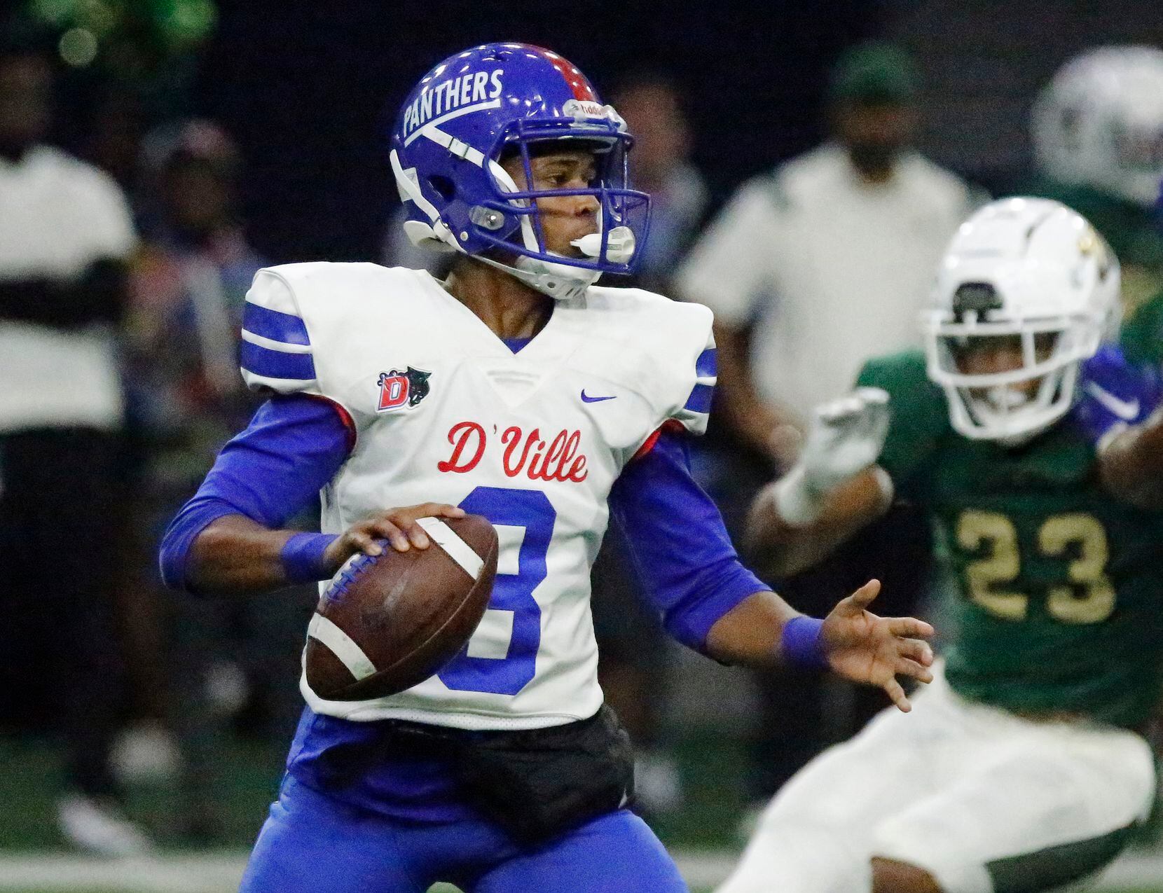 Duncanville High School quarterback Solomon James (3) makes his reads on a pass play during the first half as DeSoto High School played Duncanville High School in the Class 6A Division I Region II final playoff game at the Ford Center in Frisco on Saturday, December 4, 2021. (Stewart F. House/Special Contributor)