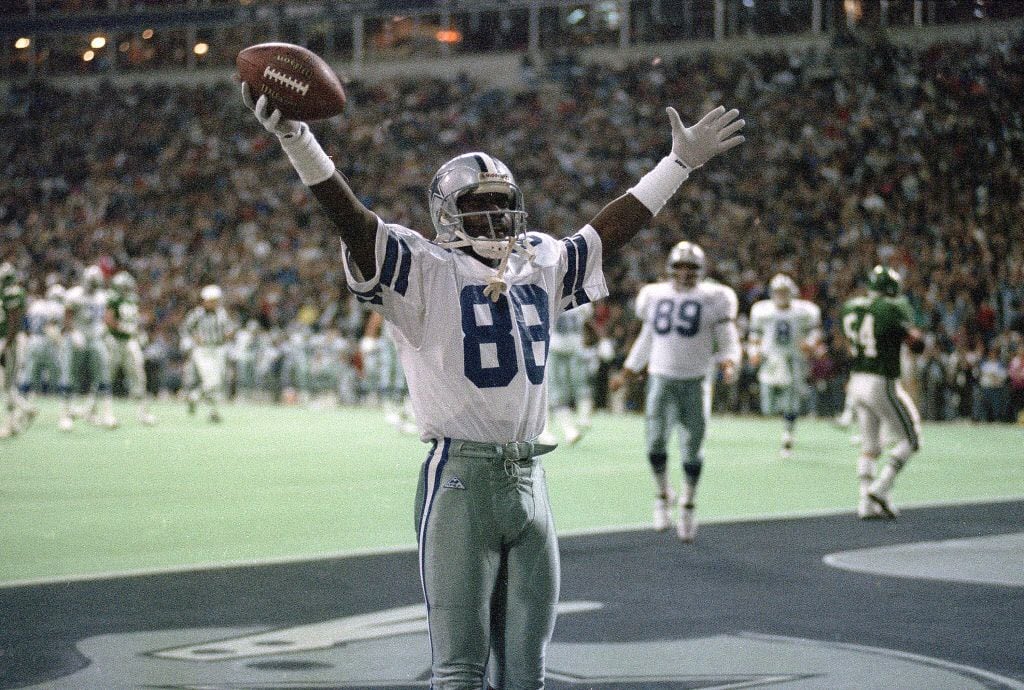  Cowboys wide receiver Michael Irvin celebrates a first quarter touchdown against the...