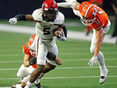 Rockwall High School safety Brendon Ross (10) and Rockwall High School free safety Jake...