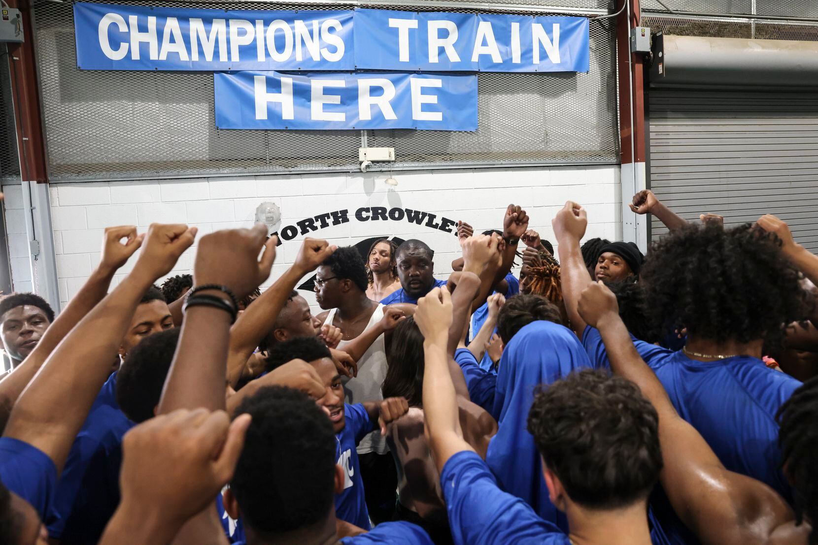 The North Crowley football team comes together after lifting weights on Monday, May 9, 2022,...