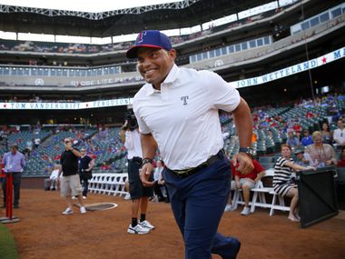 Former Texas Rangers player Ivan 'Pudge' Rodriguez  is introduced before the Texas Rangers Hall of Fame induction ceremony for former president Tom Schieffer at Globe Life Park in Arlington, Saturday, August 23, 2014. (Tom Fox/The Dallas Morning News) 