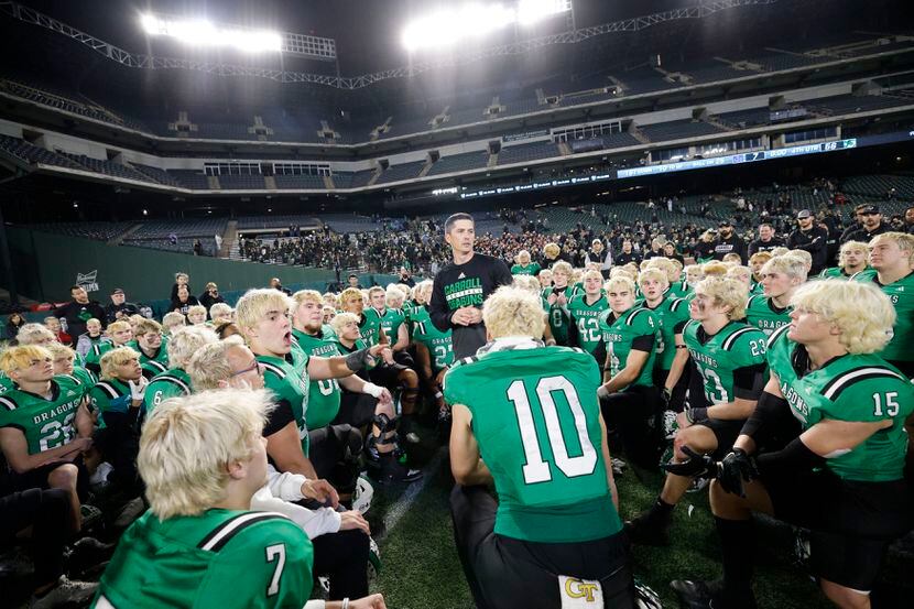 Southlake Carroll head coach Riley Dodge, center, speaks to his players after a victory over...