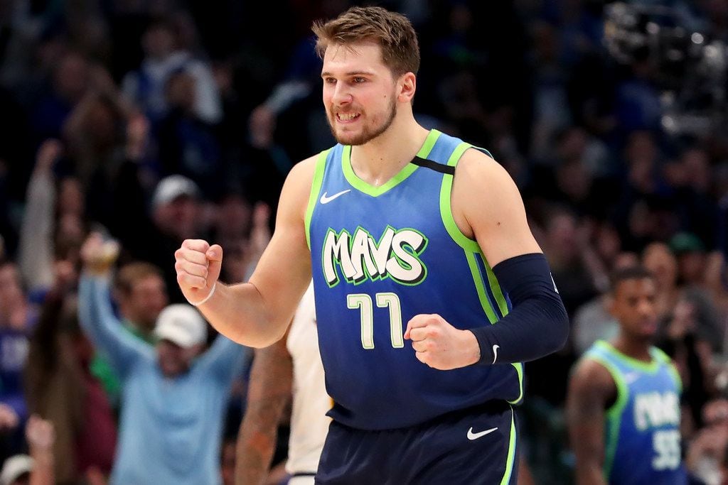DALLAS, TEXAS - JANUARY 08: Luka Doncic #77 of the Dallas Mavericks reacts against the...