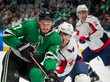 Dallas Stars left wing Mason Marchment (27) fights for the puck against Washington Capitals...