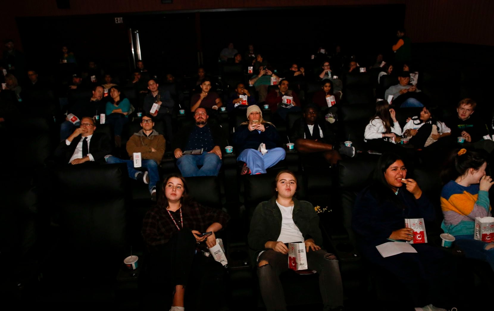 Guests check out the newly remodeled Cinemark theater in Plano. The longtime "dollar theater" was re-built with reclining chairs and upgraded snack and drink options. 