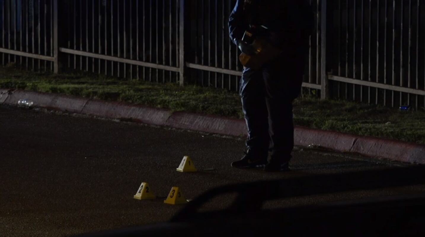 Evidence markers at the apartment complex where police were called to a shooting Saturday,...