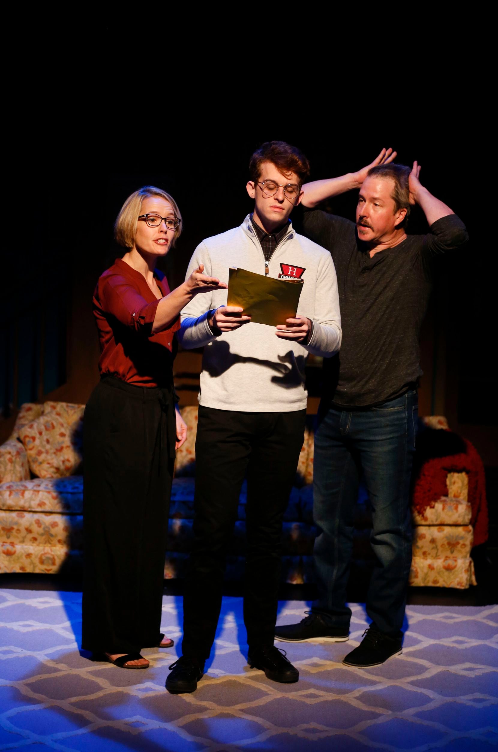 Dana Schultes, left, Evan Michael Woods and Chris Hury star in "The Lifespan of a Fact" at...