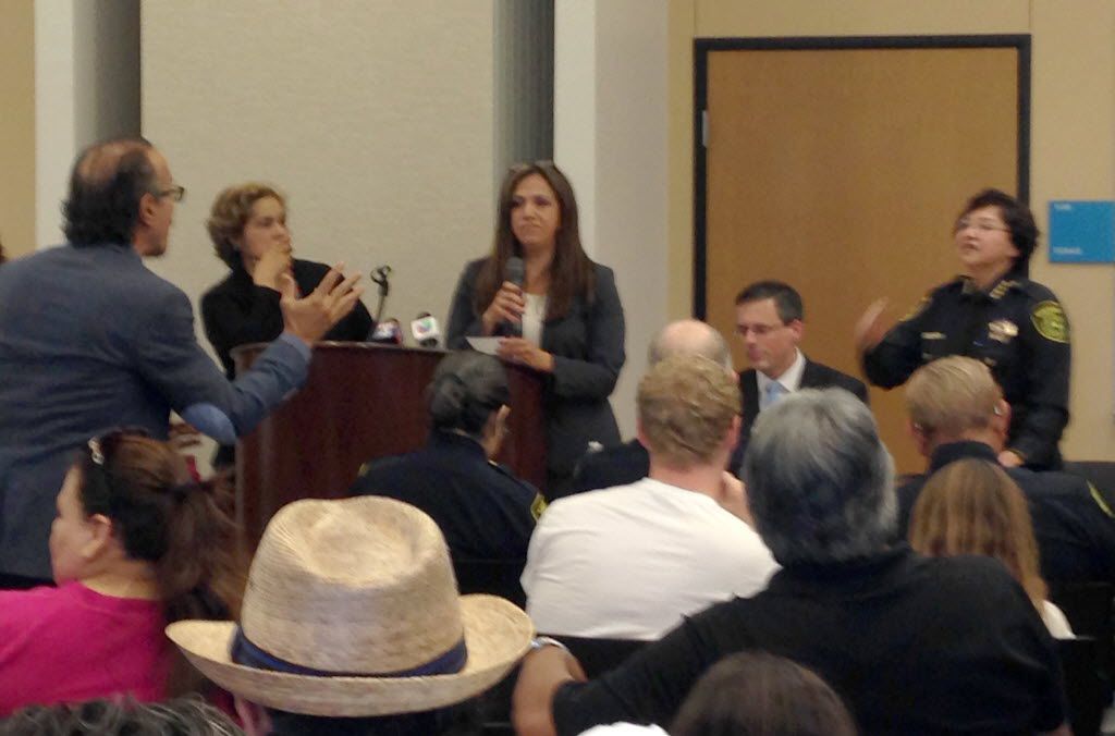 ICE chief Sarah Saldana looks startled as Dallas County Sheriff Lupe Valdez confronts...