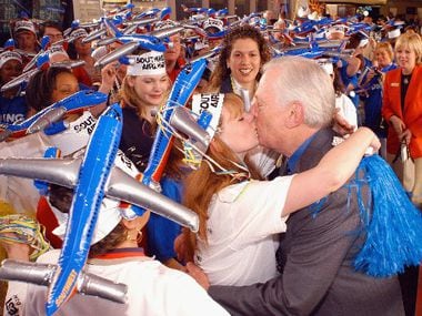 Southwest Airlines Chairman Herb Kelleher greets employees at a parade during a welcoming...