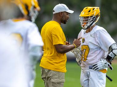 St. Mark's head coach Jason Leneau speaks with Henry Piccagli in time out against Episcopal...