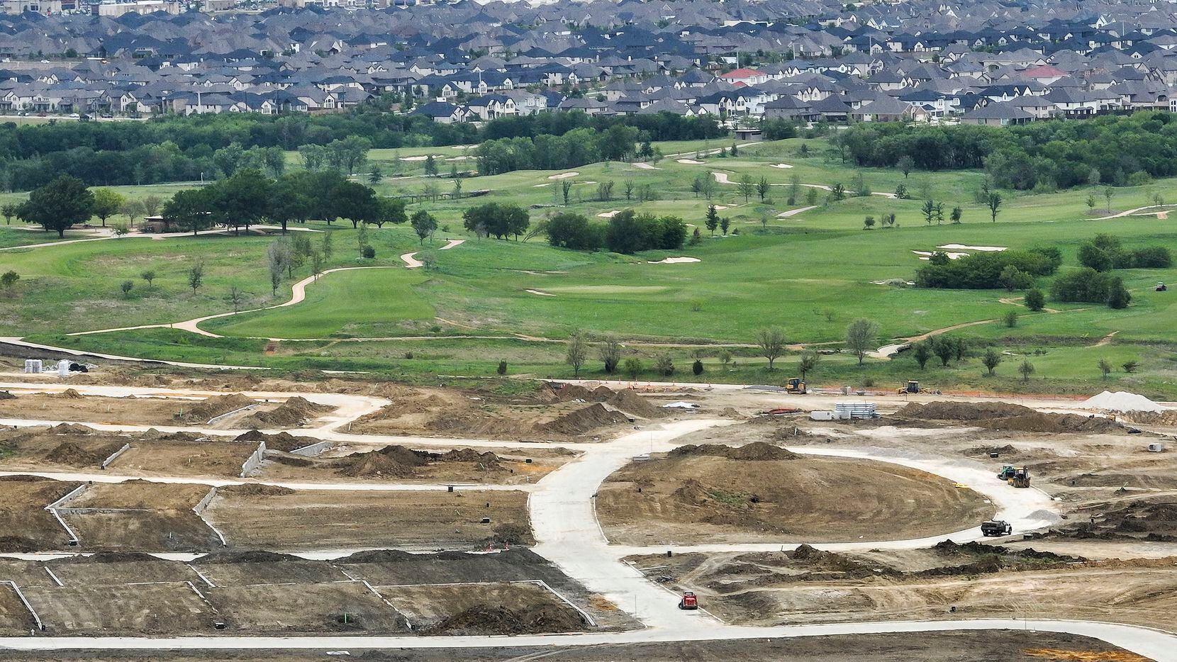 An aerial view of construction in Frisco's Fields development, south of the new PGA golf...