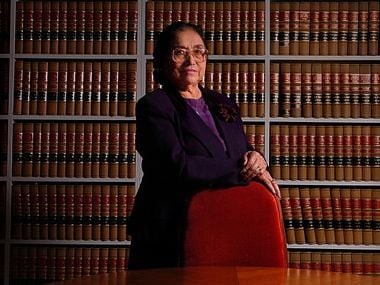 Adelfa Callejo poses for a photo in her office library. She was the first hispanic lawyer in Dallas practicing since 1961 and is regarded as the godmother of hispanic politicians in Dallas.