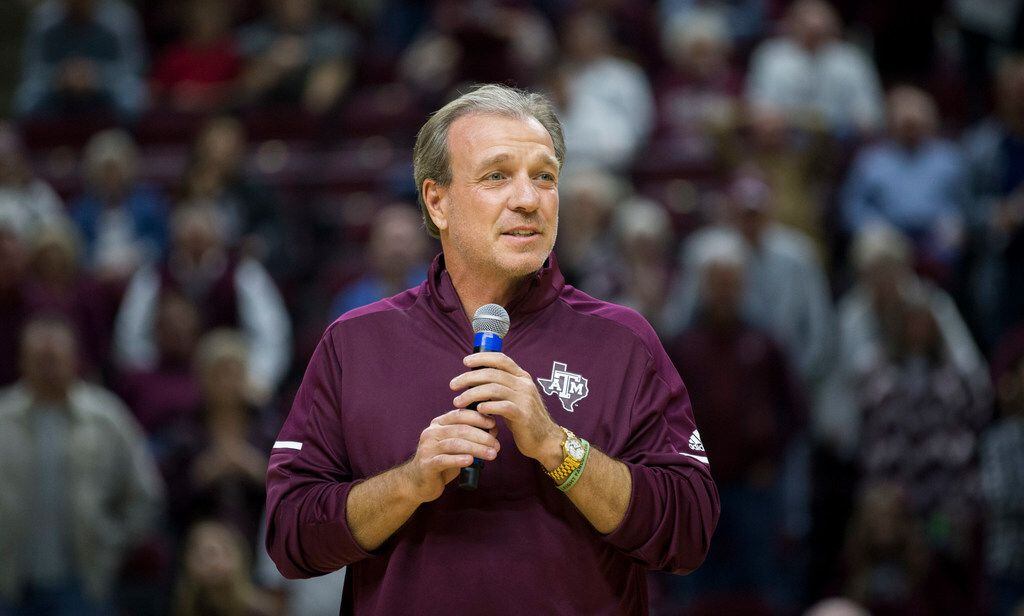 Texas A&M head football coach Jimbo Fisher talks to the crowd at Reed Arena during a timeout...