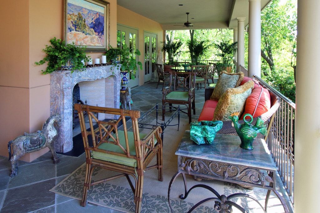 A casual, inviting look is created by mixing and matching wicker, rattan, wrought iron and...