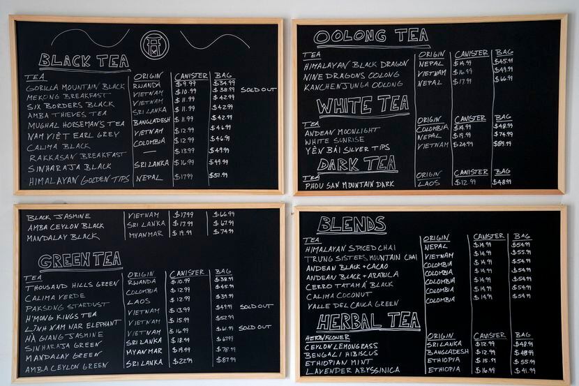 A blackboard menu hangs on the wall of Rakkasan Tea in Dallas.
