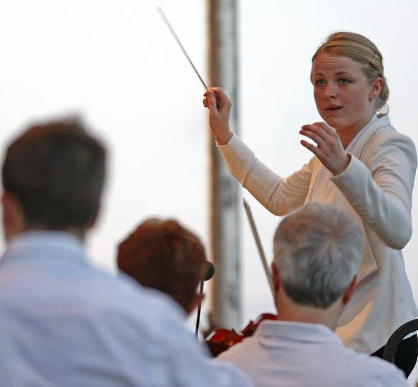 Dallas Symphony Orchestra Assistant Conductor Ruth Reinhardt conducts the orchestra during...