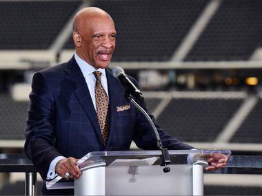 Former Dallas Cowboys player Drew Pearson, left, speaks during a press conference showing...
