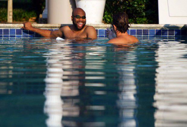  I love this photo of Dirk Ebel giving Donovan Lewis swim lessons.