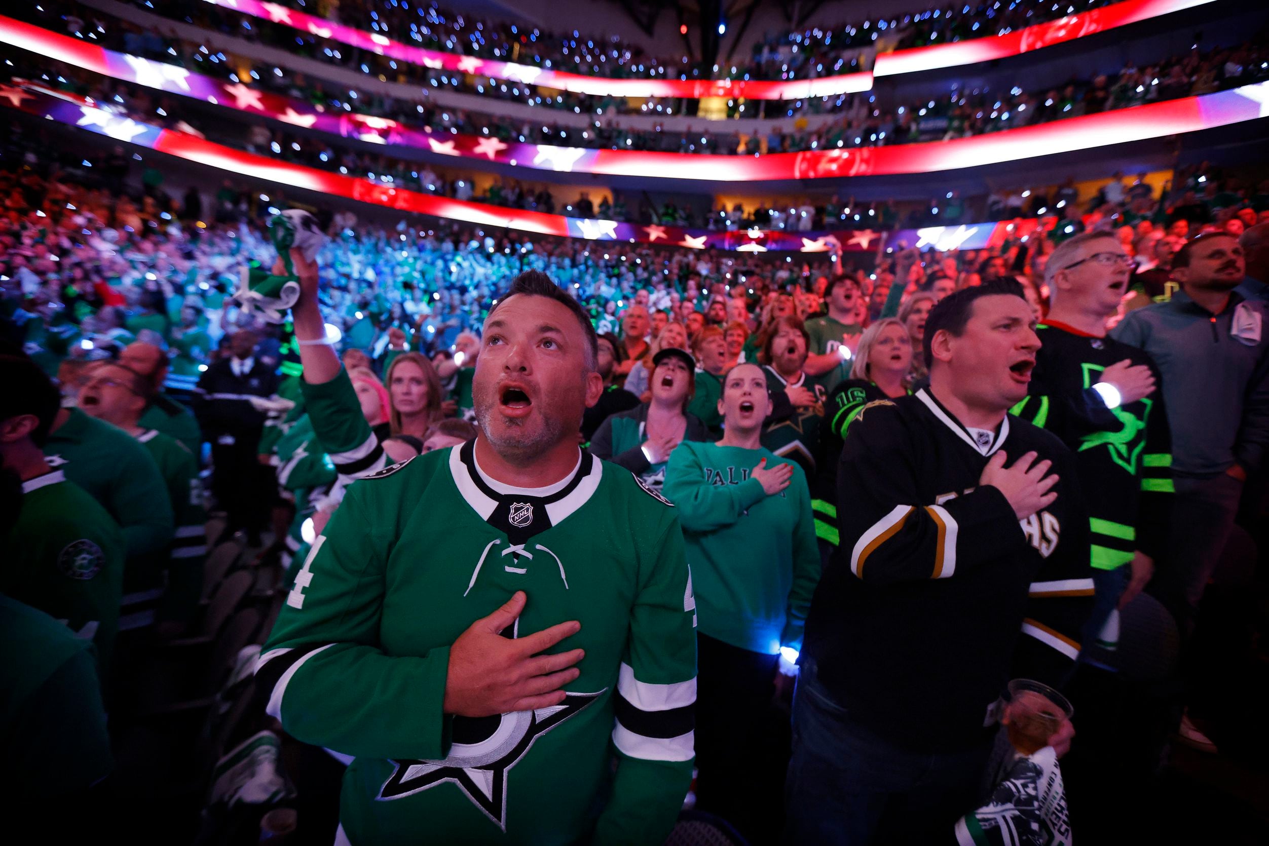 Dallas Stars fans yell ‘Stars!’ during the national anthem before Game 6 of the Stanley Cup...