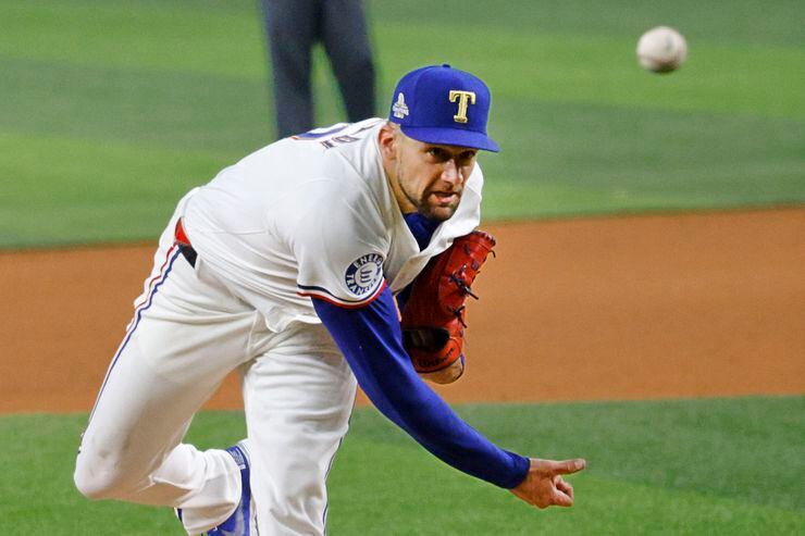 Texas Rangers starting pitcher Nathan Eovaldi (17) delivers during the fourth inning of an...