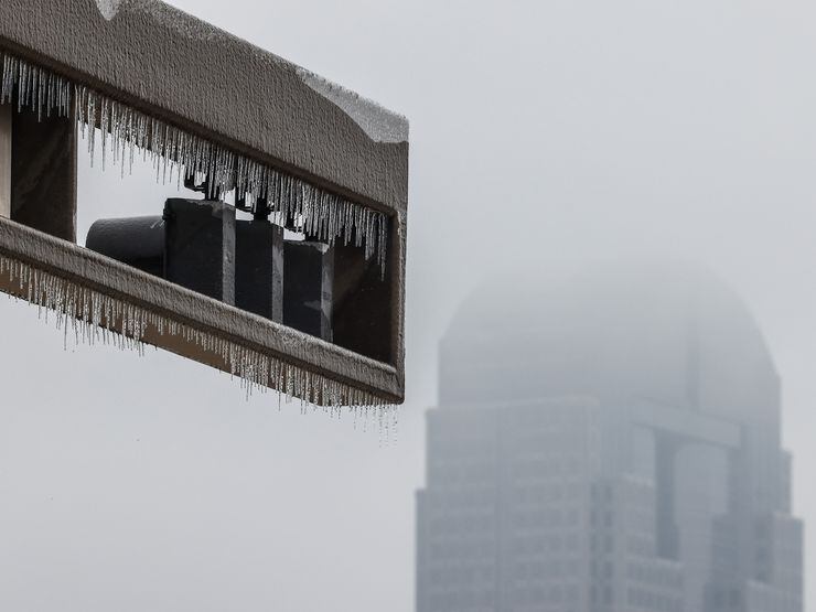 Formed icicles at N Hall St traffic light in Dallas on Feb. 2, 2023. Temps rise above...