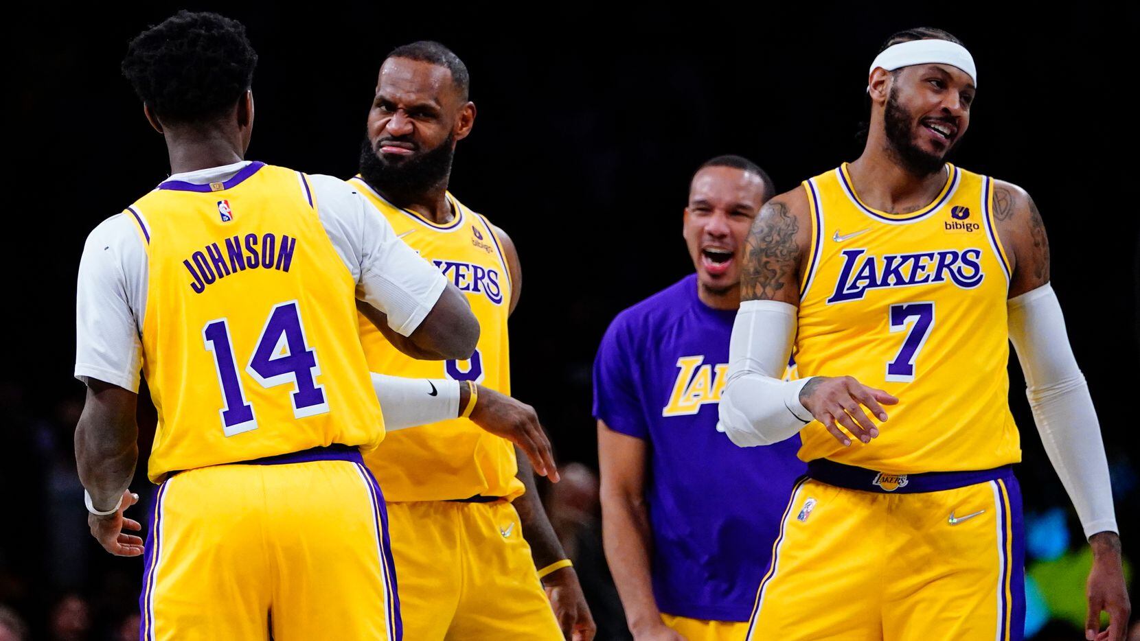 Los Angeles Lakers' LeBron James (6) celebrates with Carmelo Anthony, right, and Stanley...