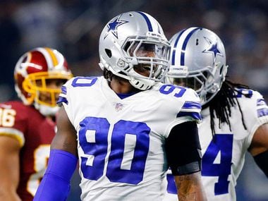 Dallas Cowboys defensive end Demarcus Lawrence (90) smiles after making a first half play against the Washington Redskins at AT&T Stadium in Arlington, Texas, Thursday, November 22, 2018. (Tom Fox/The Dallas Morning News)