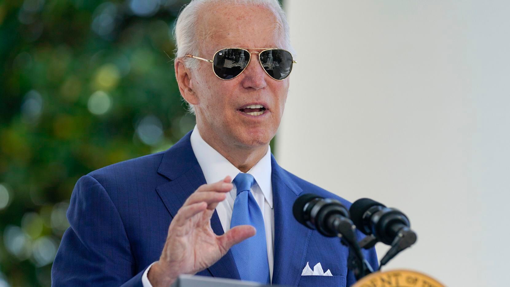 President Joe Biden speaks before signing two bills aimed at combating fraud in the COVID-19...
