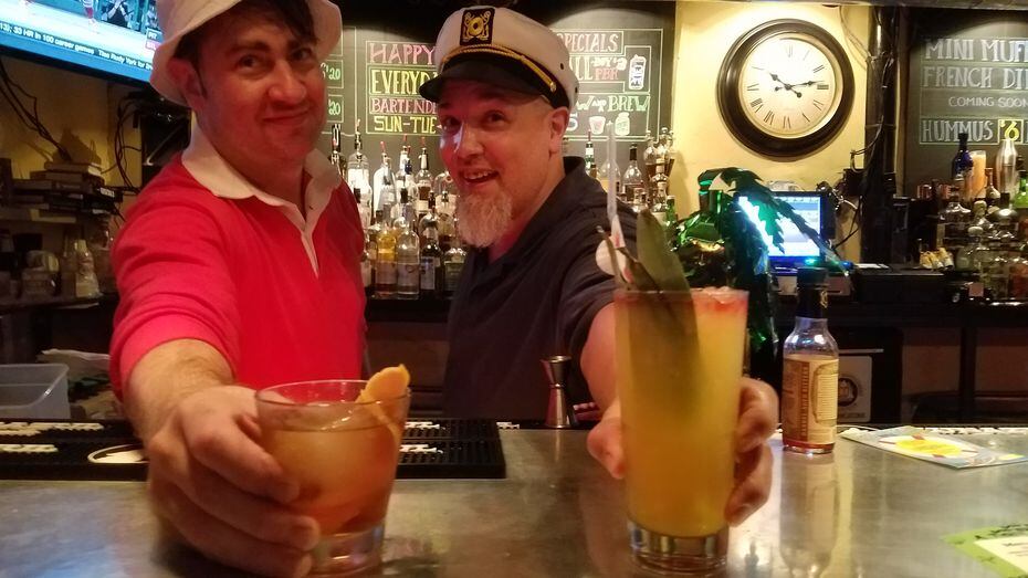 Noted tikiphile Marty Reyes, right, and bar manager Mike Steele going full Skipper and...