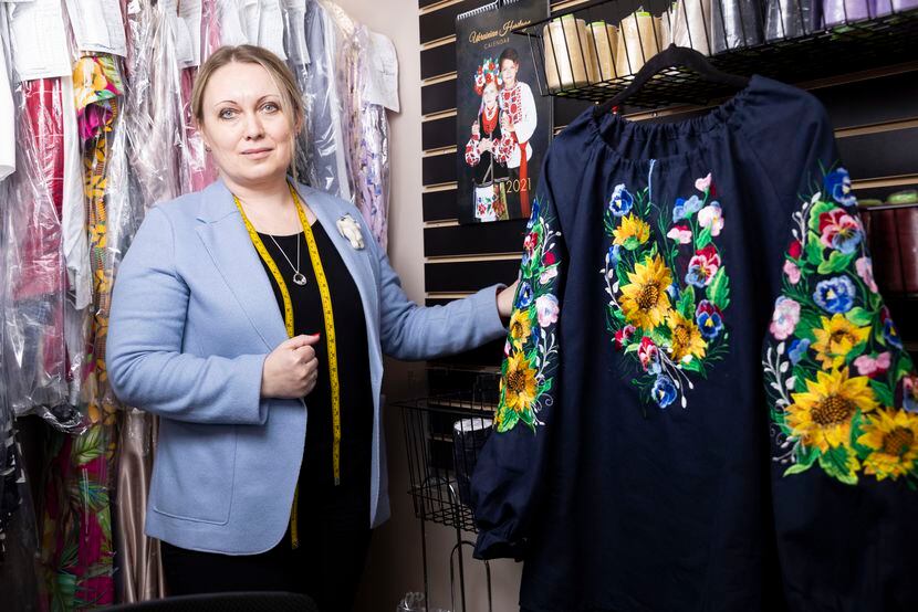 Nataliya Desheva, a clothing store owner who is Ukrainian American, poses for a photo at her...
