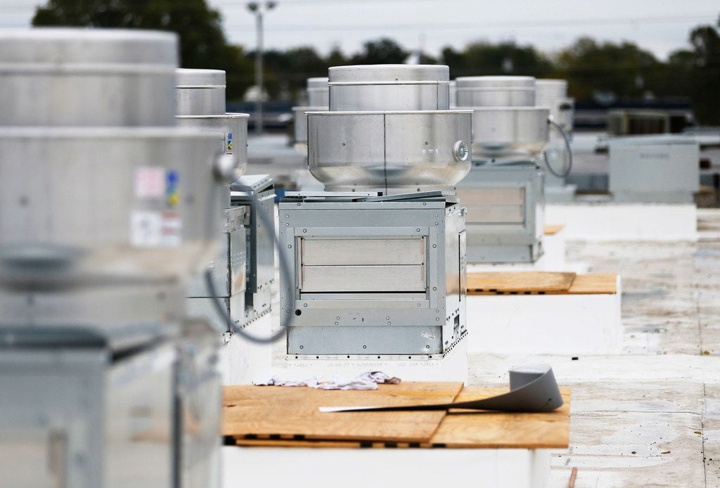 Exhaust and supply fans for the multiple kitchens on the rooftop of the Revolving Kitchen in Garland.